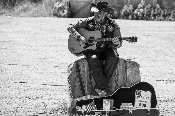 "There's a man out on the corner  singing old songs about change  everybody's got their cross to bear, these days" (Bon Jovi - These days)